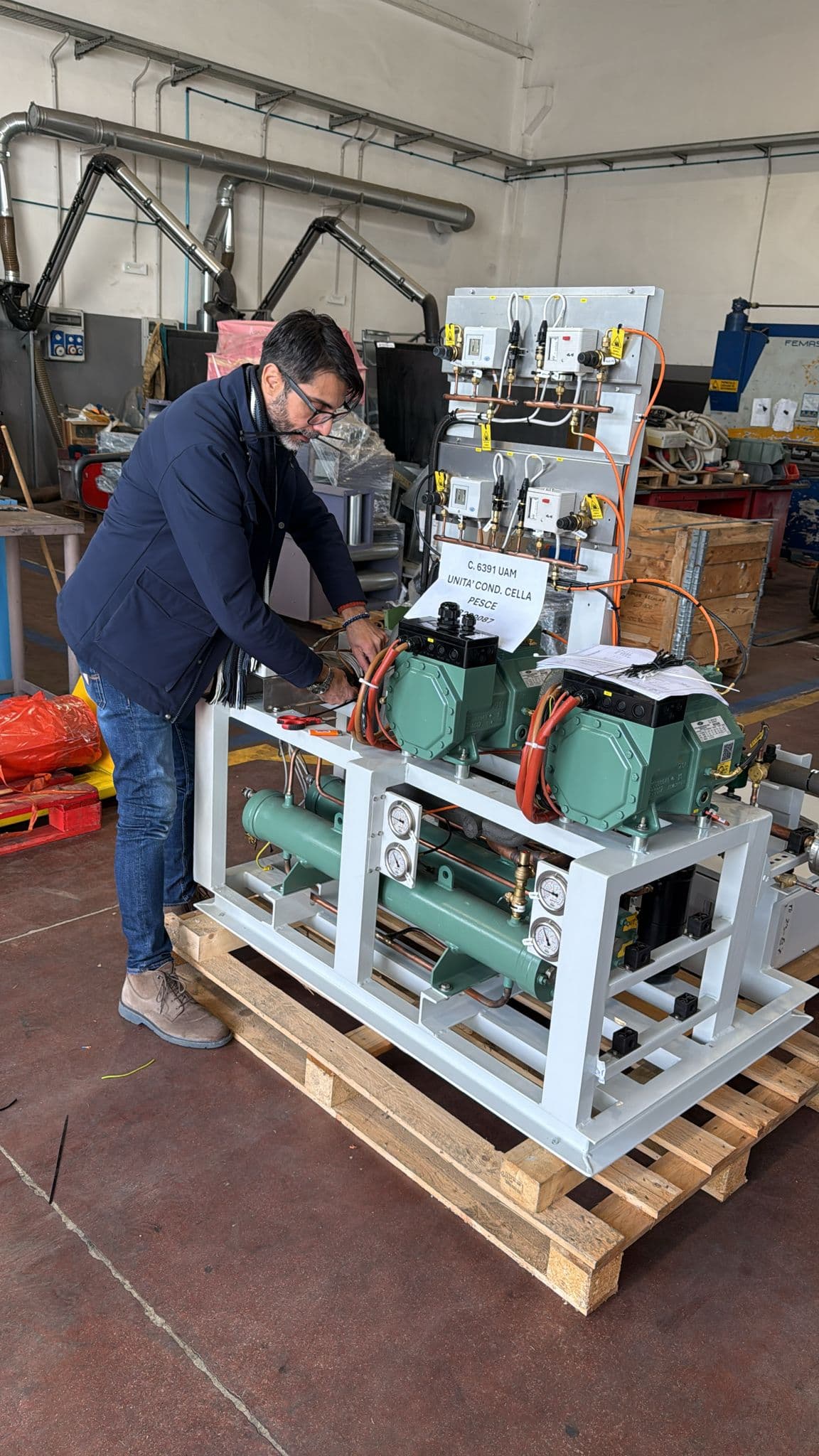 Cold room condensing unit being wired