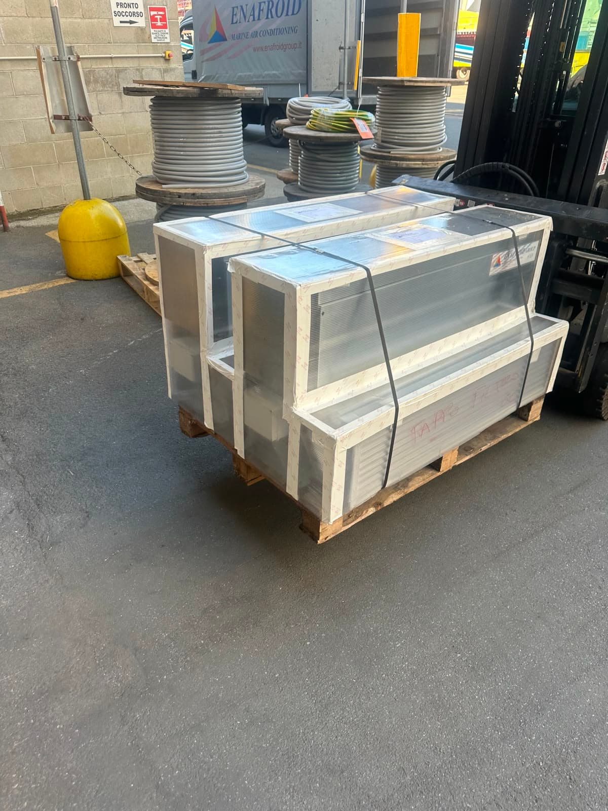 Component crated on a pallet for shipping