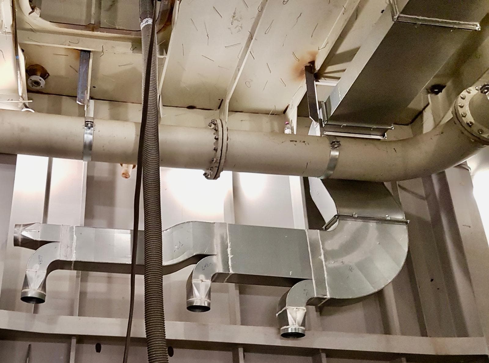 Insulated ductwork at ceiling level
