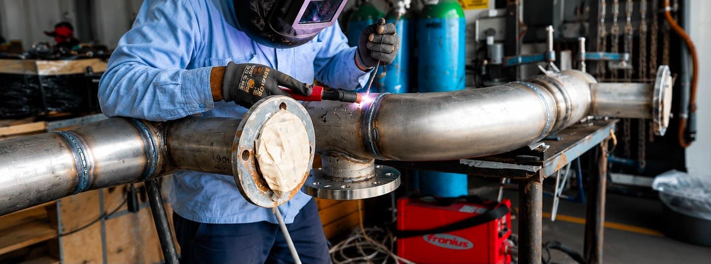 Welding flanged piping in the workshop