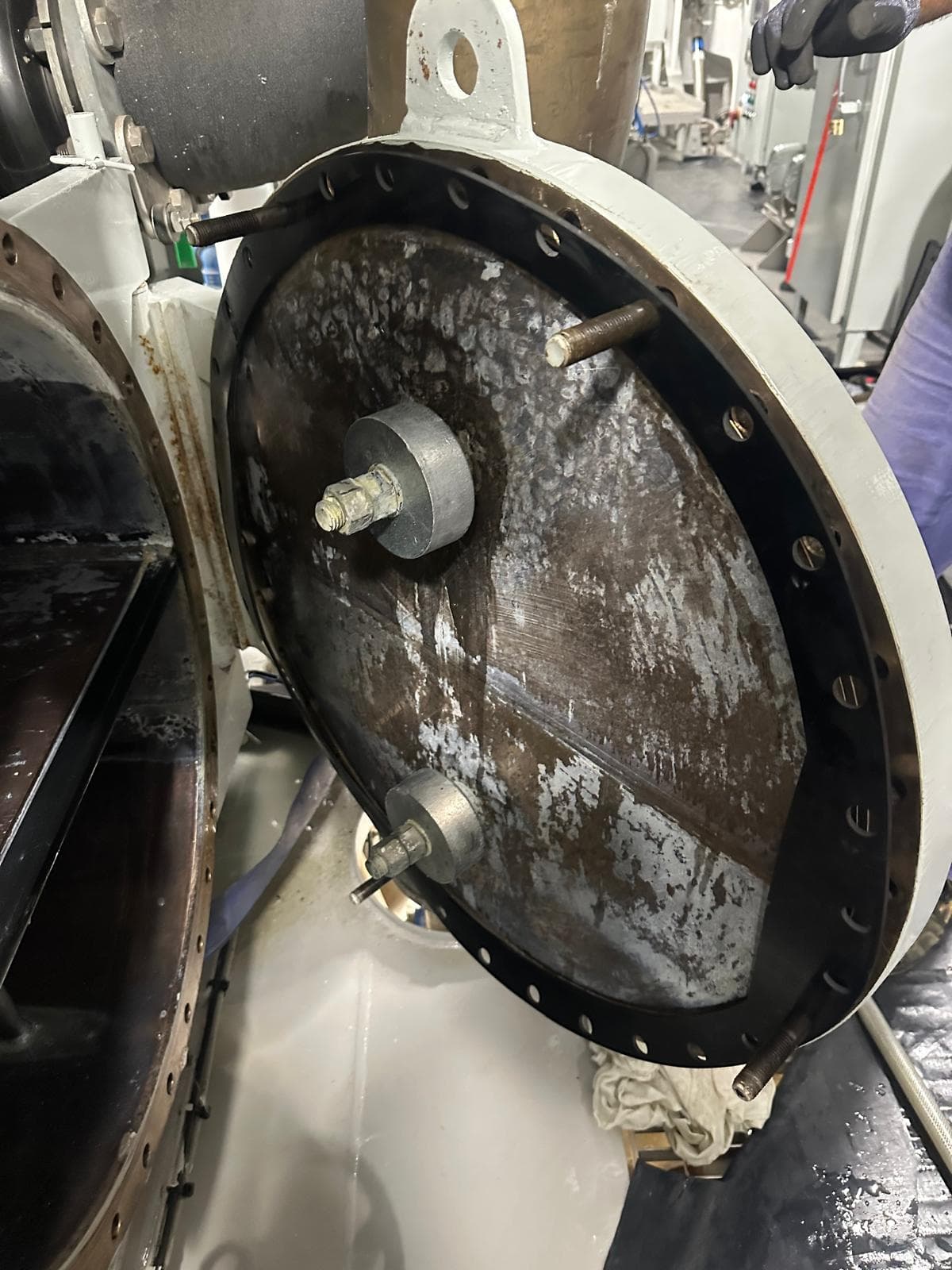 Heat exchanger head opened for maintenance
